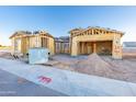 New home under construction, framing visible at 7569 W Evans Dr, Peoria, AZ 85381