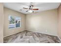 Bright bedroom with a herringbone-pattern floor at 10789 W Saddlehorn Rd, Peoria, AZ 85383