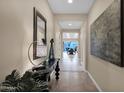 Spacious entryway showcasing a large art piece and view into the living area at 1713 E Amaranth Trl, Queen Creek, AZ 85140
