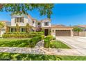 Two-story house with a landscaped lawn and walkway at 2976 E Cullumber St, Gilbert, AZ 85234