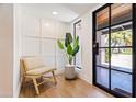 Bright entryway with modern chair and large window at 5112 N 35Th St, Phoenix, AZ 85018