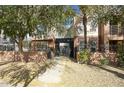Gated entrance to Artisan Parkview, providing residents with added security at 706 E Washington St # 202, Phoenix, AZ 85034