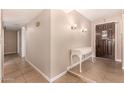 Clean hallway with light walls and tile flooring at 1018 W Ivanhoe St, Chandler, AZ 85224