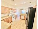 Bright kitchen with ample counter space and modern appliances at 1421 N 80Th Ln, Phoenix, AZ 85043