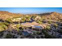 Luxury estate home with a private pool and hilltop views at 14216 S Canyon Dr, Phoenix, AZ 85048