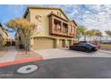 Two-story townhome with attached garage and spacious driveway at 2250 E Deer Valley Rd # 48, Phoenix, AZ 85024