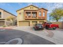 Two-story townhome with attached garage and driveway parking at 2250 E Deer Valley Rd # 48, Phoenix, AZ 85024