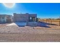 Newly built home with a two-car garage and fenced yard at 3015 W Paraiso Dr, Eloy, AZ 85131