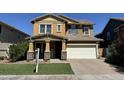 Two-story house with a landscaped yard and a welcome sign at 3548 E Mesquite St, Gilbert, AZ 85296