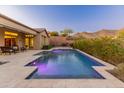 Relaxing backyard pool and patio area at 42405 N Anthem Creek Dr, Anthem, AZ 85086