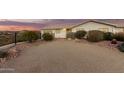 Gravel front yard with desert landscaping at 51008 N 295Th Ave, Wickenburg, AZ 85390