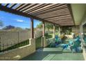 Covered patio with mountain views and comfortable seating at 6151 E Harvard St, Scottsdale, AZ 85257