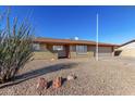 Single story home with a landscaped front yard and attached garage at 1741 N Lehmberg Ave, Casa Grande, AZ 85122