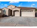 Well-maintained house featuring a two-car garage and curb appeal at 19146 W Pasadena Ave, Litchfield Park, AZ 85340