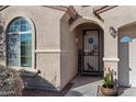 Inviting entryway with decorative door and welcoming sign at 19146 W Pasadena Ave, Litchfield Park, AZ 85340