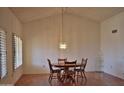 Dining room with wood floors and a chandelier at 20619 N Echo Mesa Dr, Sun City West, AZ 85375