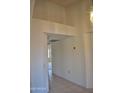 Bright hallway with high ceilings and tile flooring at 20619 N Echo Mesa Dr, Sun City West, AZ 85375