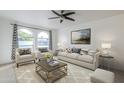 Bright living room featuring a neutral color palette and comfy seating at 2818 S Cottonwood Dr, Tempe, AZ 85282