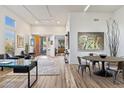 Bright and airy living room with hardwood floors and stylish furnishings at 34476 N 68Th Way, Scottsdale, AZ 85266