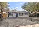 Updated home with stone pathway and front yard at 4607 E Park St, Phoenix, AZ 85042