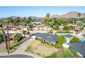 House with a pool and driveway, aerial view at 4728 E Mulberry Dr, Phoenix, AZ 85018