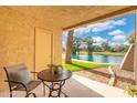 Covered patio overlooking a tranquil lake at 5136 N 31St Pl # 614, Phoenix, AZ 85016