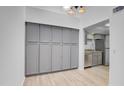 Modern kitchen with gray cabinets and granite countertops at 629 N Mesa Dr # 29, Mesa, AZ 85201