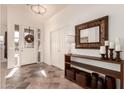 Bright and airy foyer with tile flooring and decorative accents at 9312 E Arrowvale Dr, Sun Lakes, AZ 85248