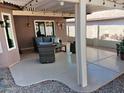 Covered patio with seating area and pergola at 10728 W Irma Ln, Sun City, AZ 85373