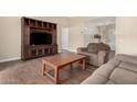 Living room featuring a media cabinet and comfy seating at 1243 E Avenida Grande --, Casa Grande, AZ 85122