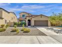 Two-story house with a two-car garage and nicely landscaped front yard at 18749 W San Miguel Ave, Litchfield Park, AZ 85340