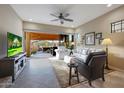 Living room with sliding doors leading to a patio and a view of backyard at 2026 N Atwood --, Mesa, AZ 85207