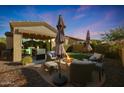 Backyard patio with fire pit and seating area at 2026 N Atwood --, Mesa, AZ 85207