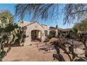 Cute Spanish-style home with cacti and a nicely landscaped yard at 2515 N 10Th St, Phoenix, AZ 85006