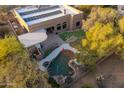 Aerial view showcasing solar panels and a backyard pool at 29991 N 78Th Pl, Scottsdale, AZ 85266