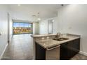 Modern kitchen with granite countertops and stainless steel appliances at 15215 N Kierland Blvd # 632, Scottsdale, AZ 85254