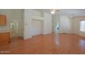 Bright living room with light wood flooring and neutral walls at 2490 E Fiesta Dr, Casa Grande, AZ 85194