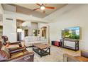 Relaxing living room with large TV and ample seating at 27506 N Montana Dr, Rio Verde, AZ 85263