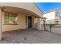 Front entry with brick pavers and covered walkway at 3040 N Point Ridge Rd, Buckeye, AZ 85396