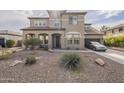 Two-story house with a large driveway and landscaped front yard at 3151 E Turnberry Dr, Gilbert, AZ 85298