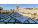 Elevated hot tub with surrounding landscaping at 316 E Leverenz Ave, Queen Creek, AZ 85140