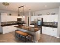 Modern kitchen with stainless steel appliances and an island at 3432 E Bartlett Dr, Gilbert, AZ 85234