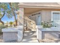 Front entry with a decorative door and small porch at 4102 E Ray Rd # 1006, Phoenix, AZ 85044