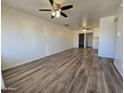 Bright living room with wood-look floors at 4649 S 17Th St, Phoenix, AZ 85040