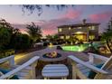 Inviting backyard oasis with a sparkling pool and fire pit at 5429 E Barwick Dr, Cave Creek, AZ 85331