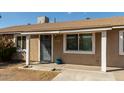 House front entrance with porch and landscaping at 5934 W Coronado Rd, Phoenix, AZ 85035