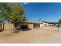 House exterior with tree and driveway at 5934 W Coronado Rd, Phoenix, AZ 85035