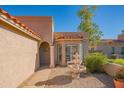 Front entrance with fountain and columned walkway at 6425 N 79Th St, Scottsdale, AZ 85250