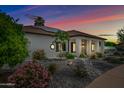 House exterior showcasing a side view of the home at dusk at 715 S Cactus Wren St, Gilbert, AZ 85296