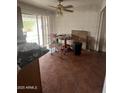 Bright dining area with tile floors and access to the backyard at 7341 N 39Th Ave, Phoenix, AZ 85051